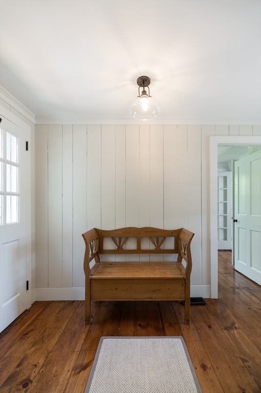 4 Linden Street Wenham, MA 01984 - Photo 25 of 27 a living room with a couch and wooden floor