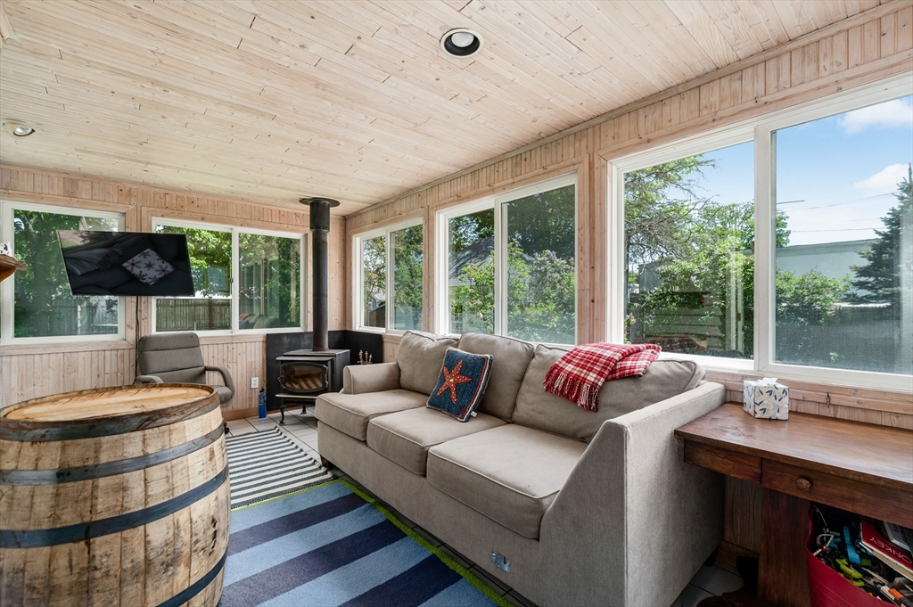 4 Linden Street Wenham, MA 01984 - Photo 27 of 27 a living room with furniture and a large window