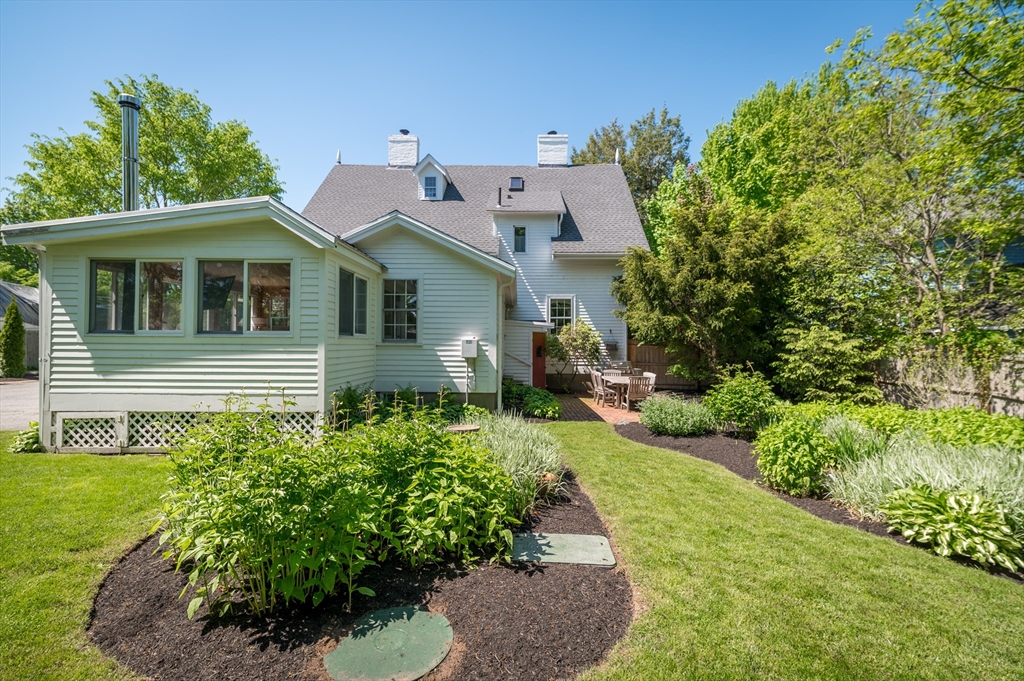 4 Linden Street Wenham, MA 01984 - Photo 5 of 27 a front view of a house with a yard