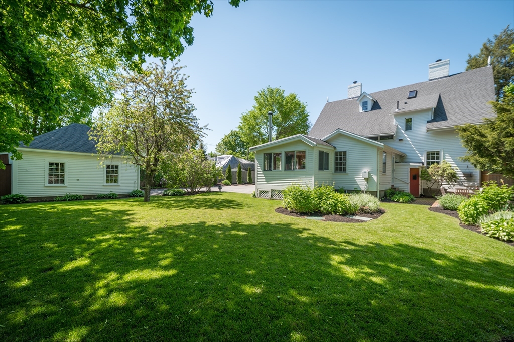 4 Linden Street Wenham, MA 01984 - Photo 8 of 27 a front view of a house with a yard