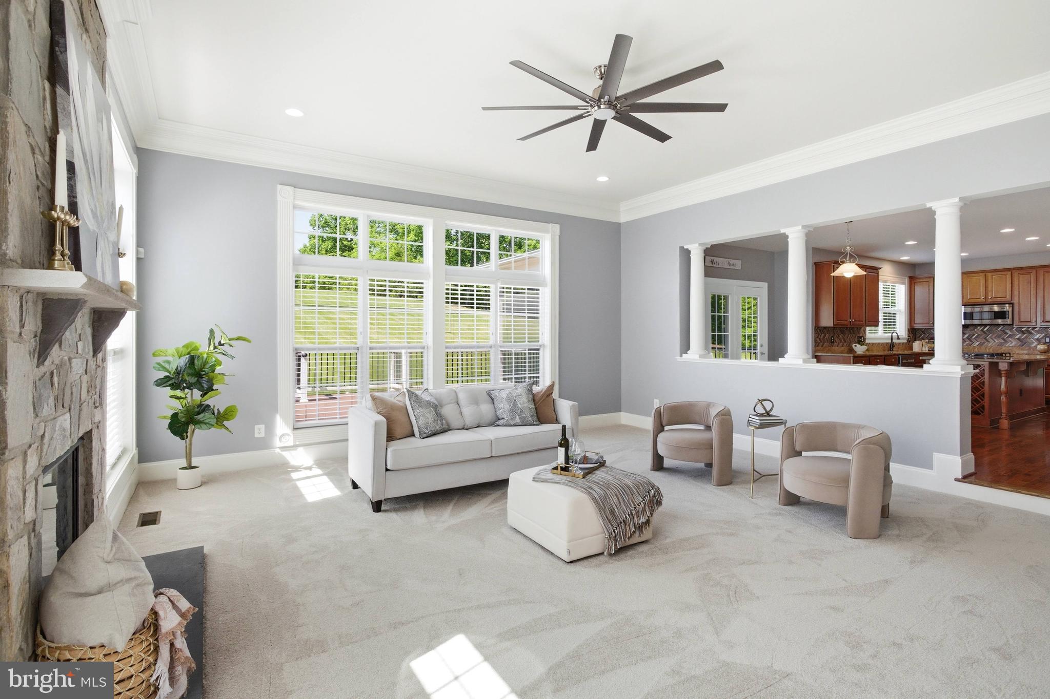 18475 Kerill Road Triangle, VA 22172 - Photo 4 of 99 a living room with furniture and a fireplace