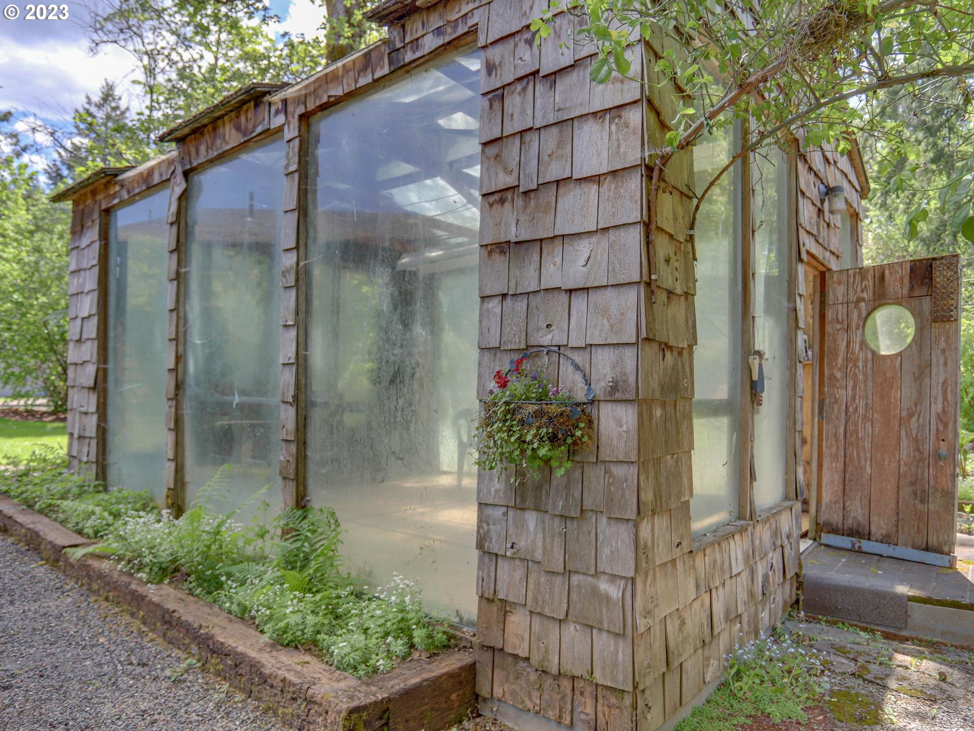 24347 Southeast Filbert Road Eagle Creek, OR 97022 - Photo 23 of 48 a front view of a house with a glass door