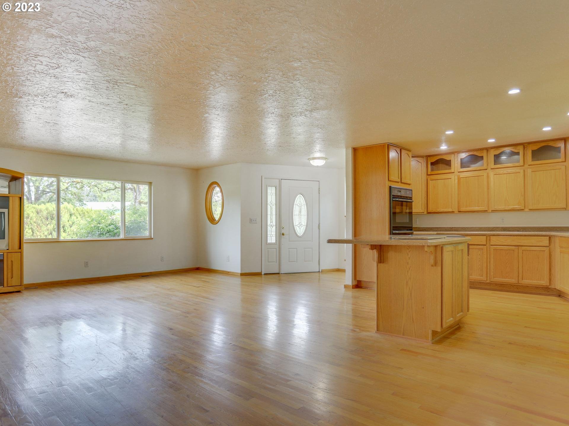 24347 Southeast Filbert Road Eagle Creek, OR 97022 - Photo 9 of 48 a view of a kitchen with a sink and a window