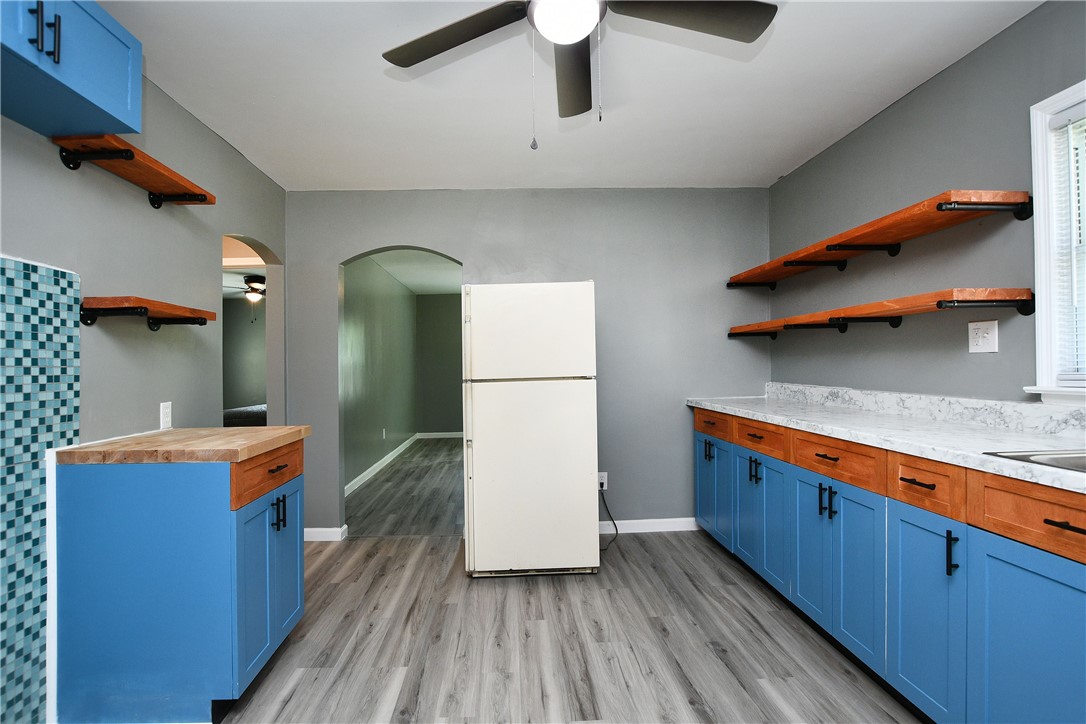 102 Hunter Street Anderson, SC 29625 - Photo 5 of 31 Kitchen with living room arch