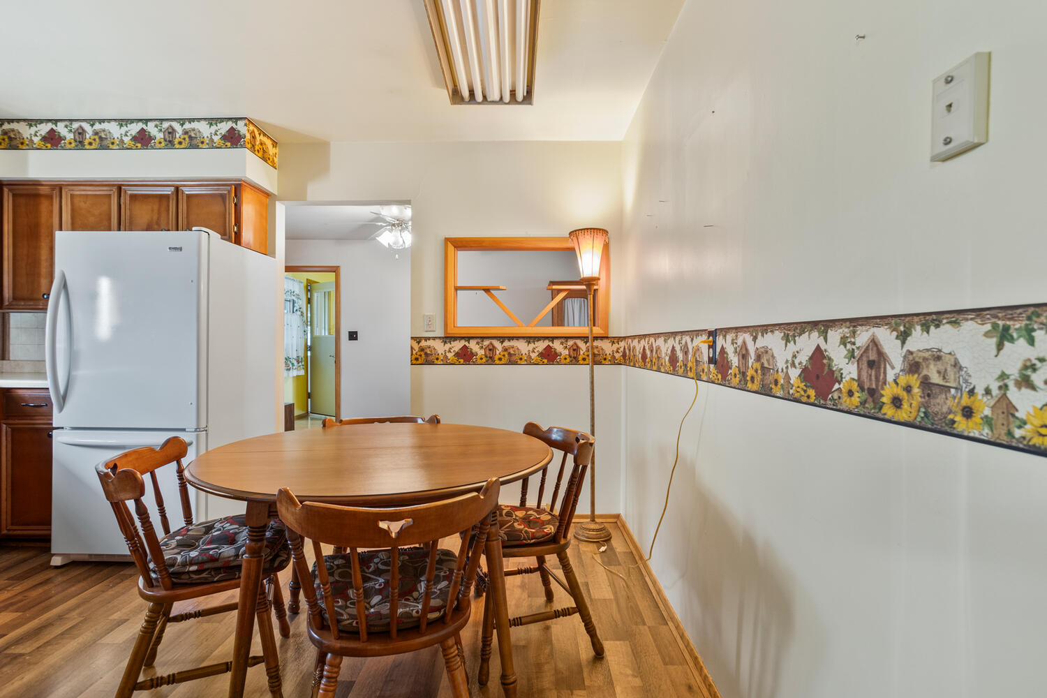 509 East Oak Street Chatsworth, IL 60921 - Photo 9 of 33 a dining room with furniture and wooden floor
