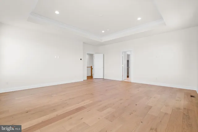 a front view of a house with a yard table and chairs