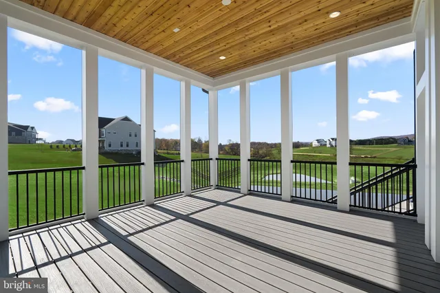 a view of a lake with a yard