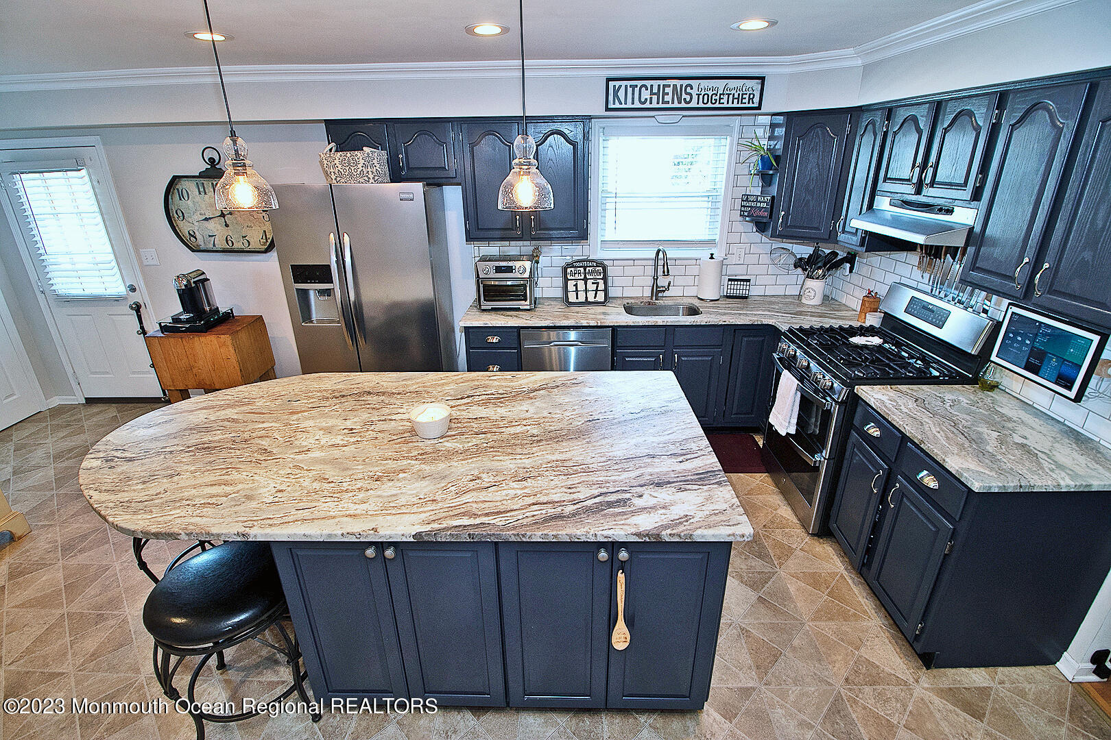 54 Davids Lane Howell, NJ 07731 - Photo 13 of 45 a kitchen with stainless steel appliances granite countertop a sink dishwasher stove a refrigerator and wooden cabinets
