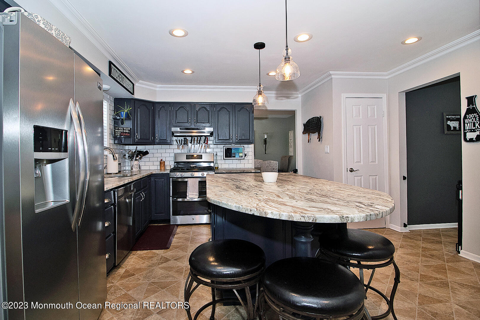 54 Davids Lane Howell, NJ 07731 - Photo 17 of 45 a kitchen with stainless steel appliances granite countertop a stove refrigerator and cabinets