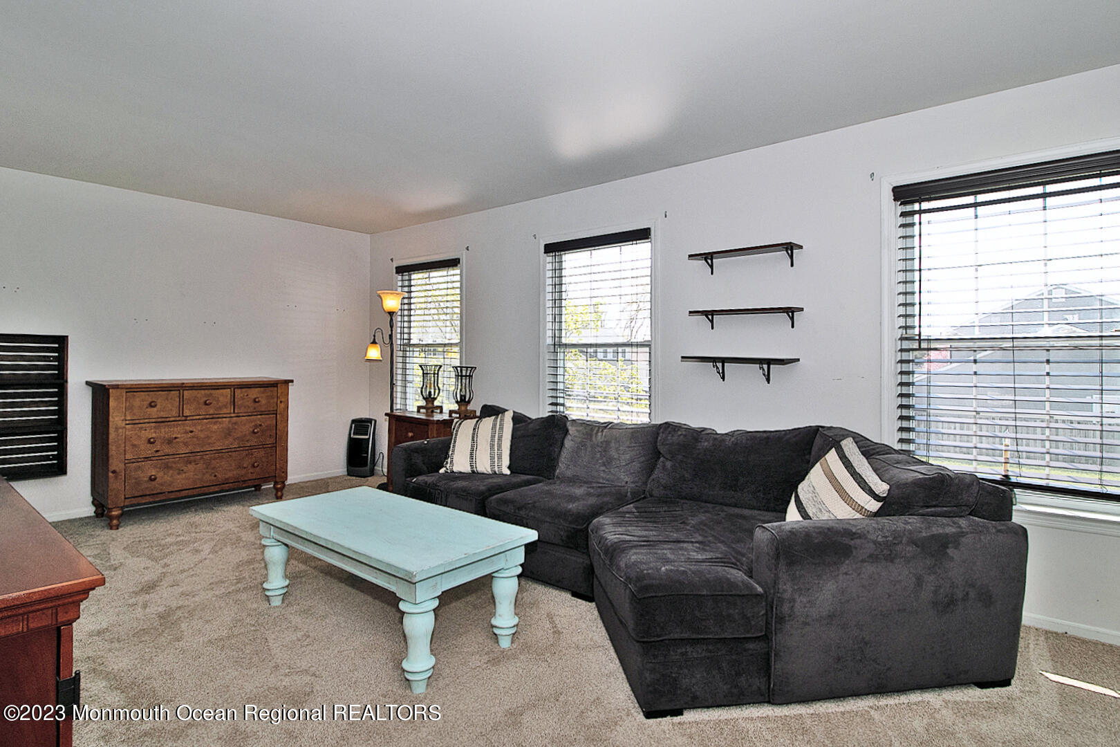 54 Davids Lane Howell, NJ 07731 - Photo 24 of 45 a living room with furniture and a window
