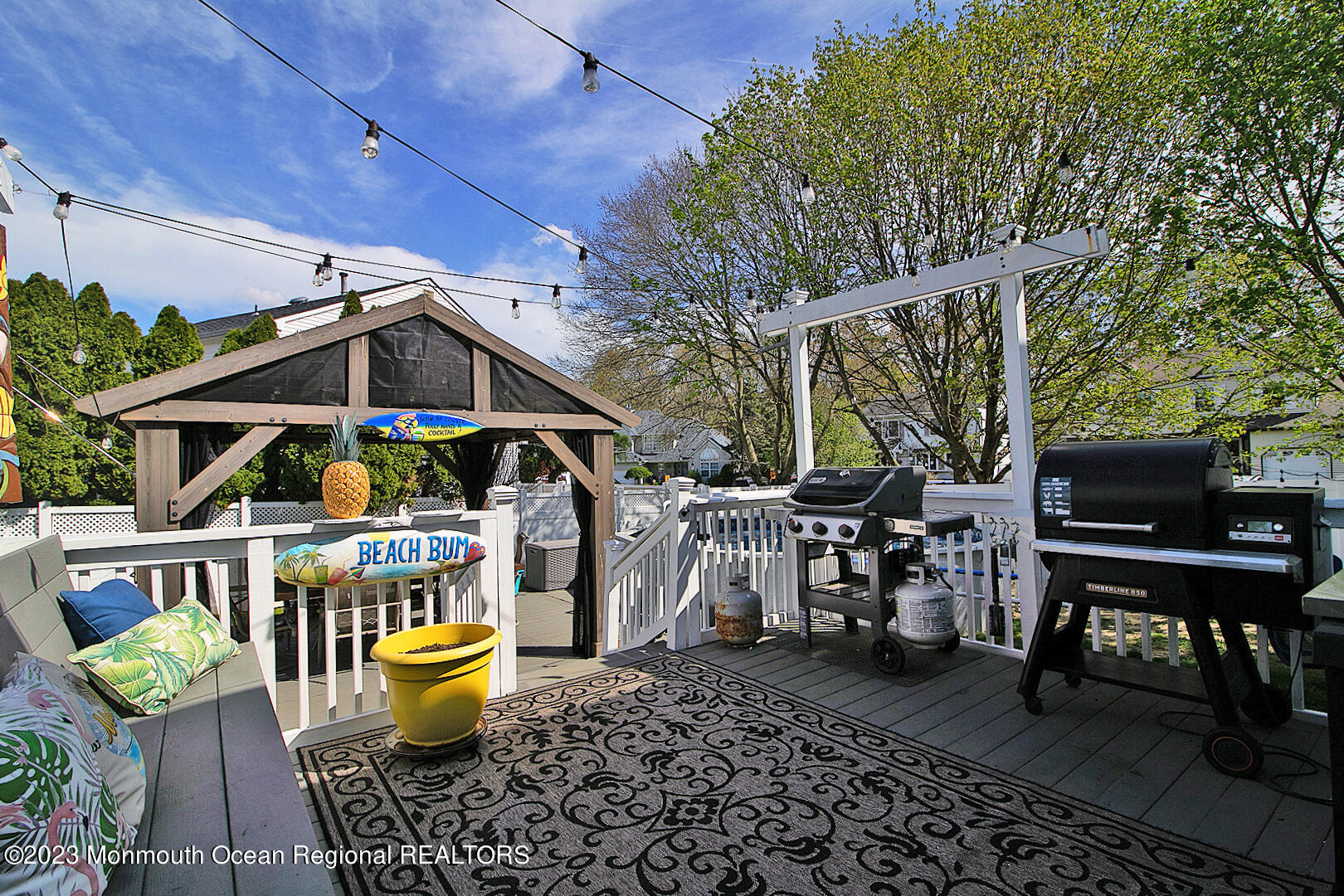 54 Davids Lane Howell, NJ 07731 - Photo 38 of 45 a table and chairs in the patio