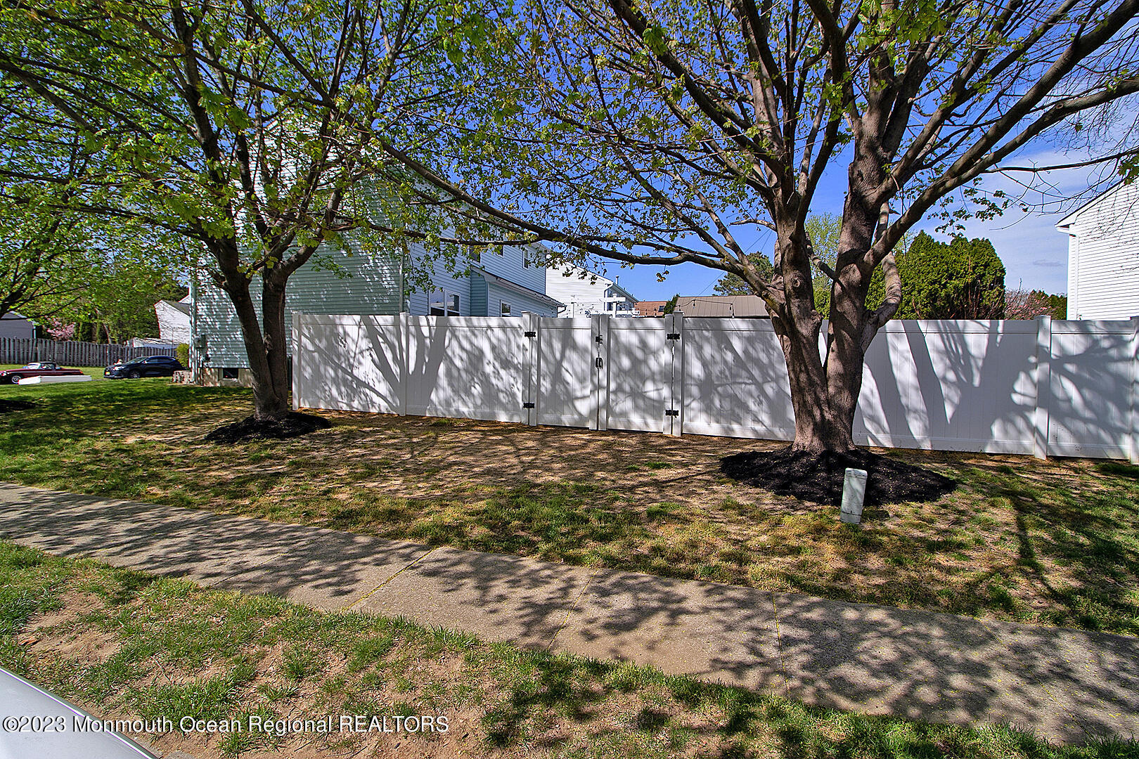 54 Davids Lane Howell, NJ 07731 - Photo 4 of 45 a view of a yard with a tree