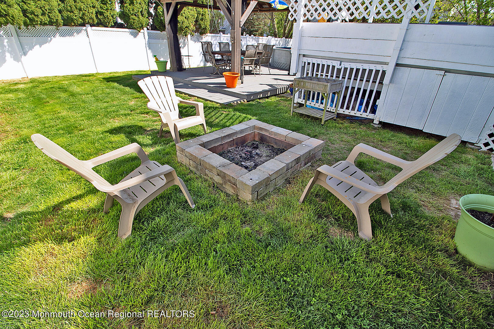 54 Davids Lane Howell, NJ 07731 - Photo 44 of 45 a view of a backyard with sitting area