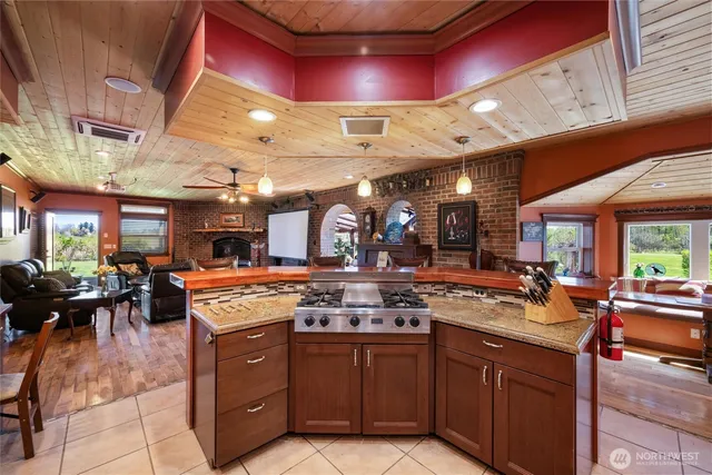 a bedroom with a large bed and a large window