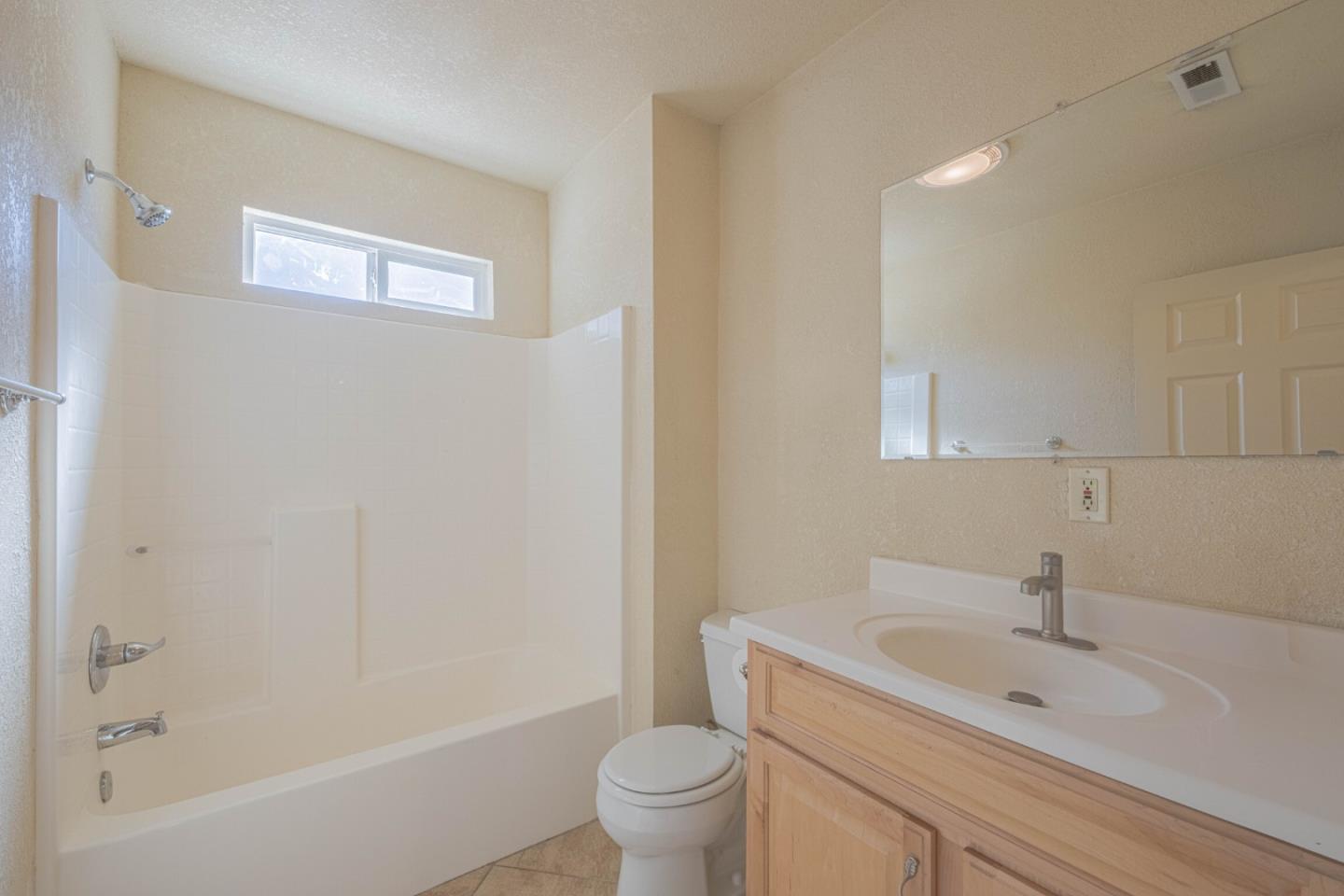 40 Oak Street Salinas, CA 93901 - Photo 24 of 28 a bathroom with a sink a toilet and shower
