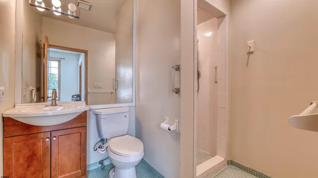 a view of an empty room with a fireplace