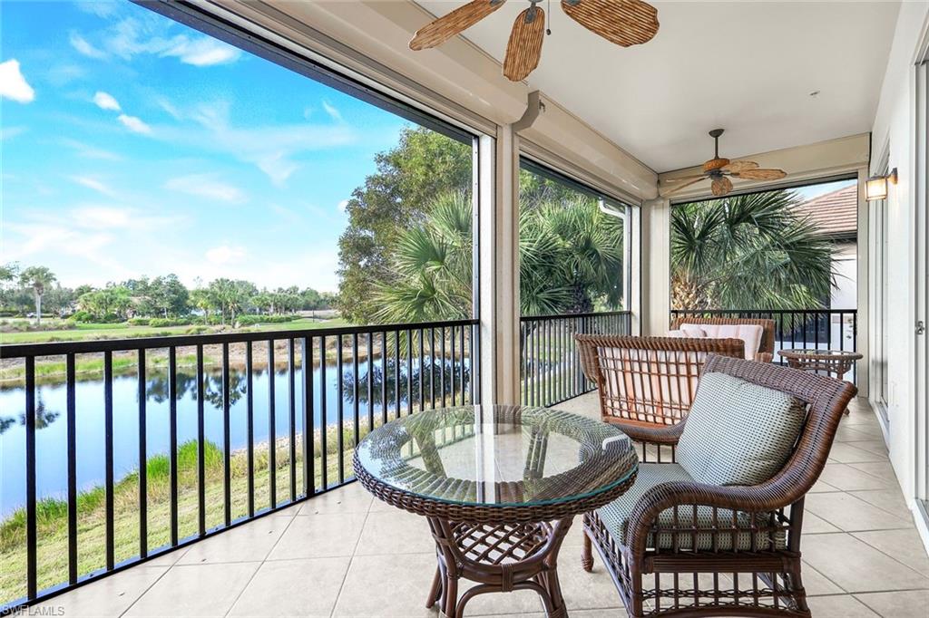 9513 Ironstone Terrace, Unit 202 Naples, FL 34120 - Photo 28 of 47 a view of a two chairs in the balcony