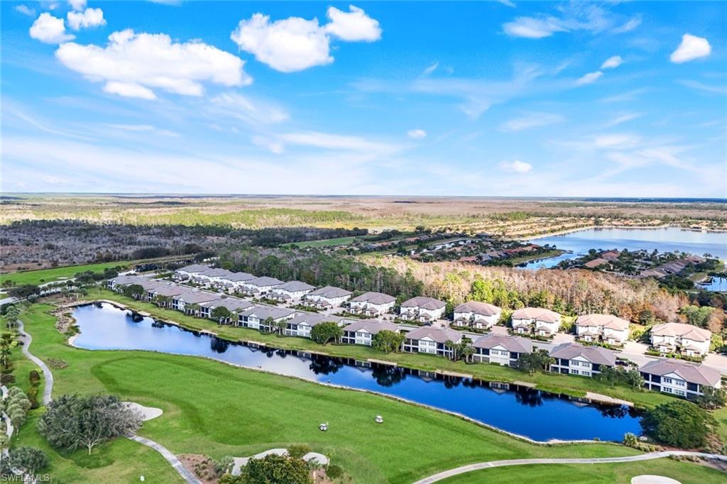 9513 Ironstone Terrace, Unit 202 Naples, FL 34120 - Photo 31 of 47 a view of a city with an ocean