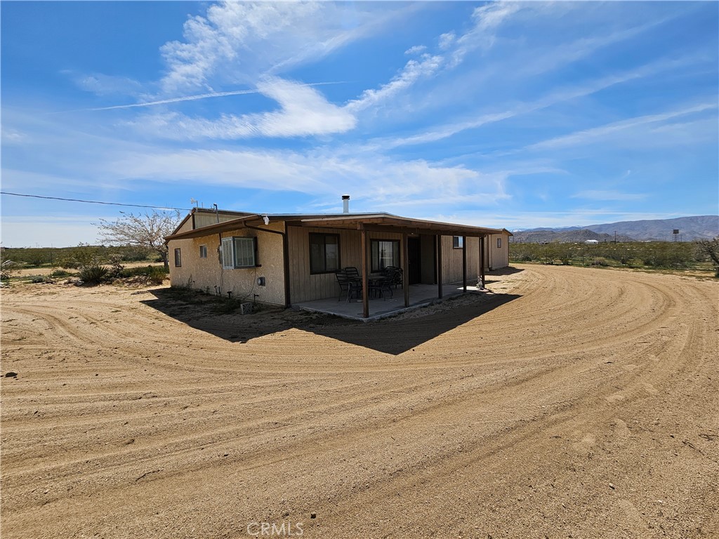 5566 Oleta Road Johnson Valley, CA 92285 - Photo 1 of 48 a view of house with ocean view