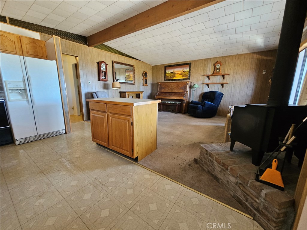 5566 Oleta Road Johnson Valley, CA 92285 - Photo 15 of 48 a bed room with furniture and a window