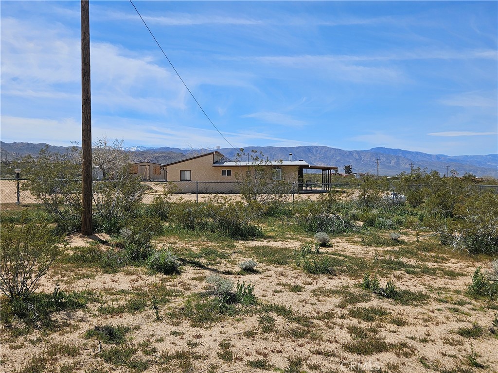5566 Oleta Road Johnson Valley, CA 92285 - Photo 33 of 48 a view of a yard with an ocean view