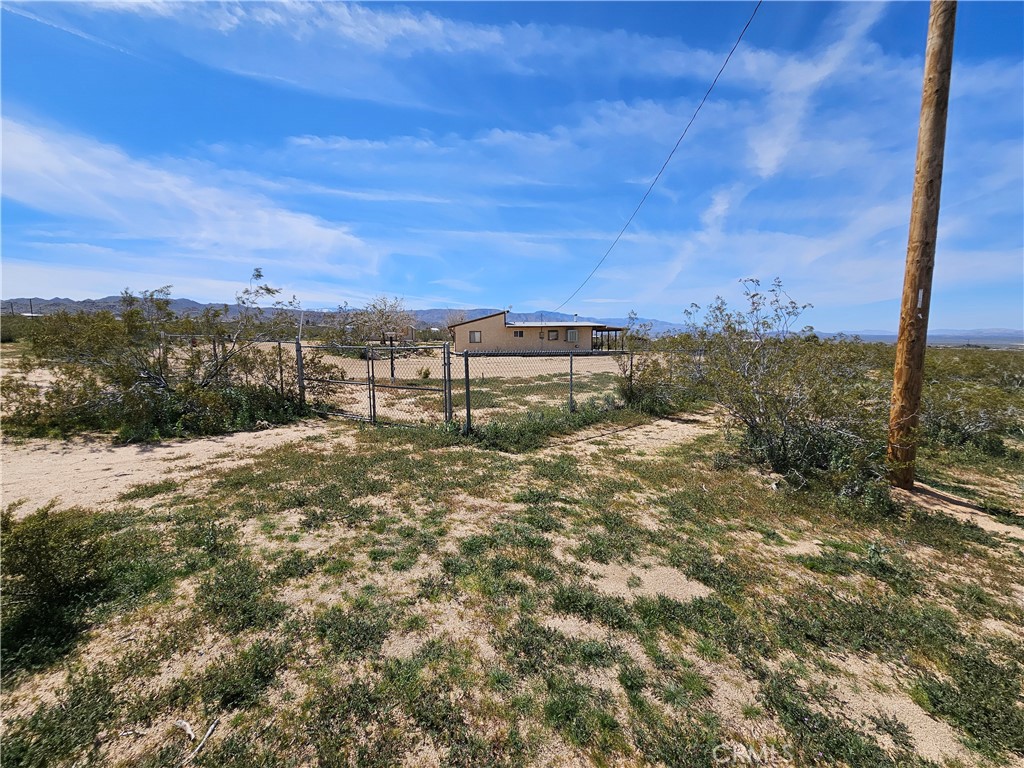 5566 Oleta Road Johnson Valley, CA 92285 - Photo 45 of 48 a view of a lake with a mountain
