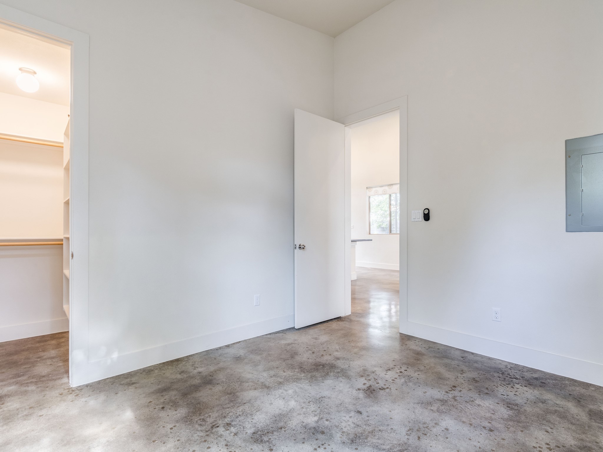 1404 Singleton Avenue, Unit B Austin, TX 78702 - Photo 10 of 21 Minimalist design and polished concrete flooring define this flexible interior space.