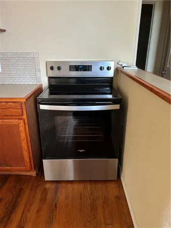 a bed room with a bed and a mirror