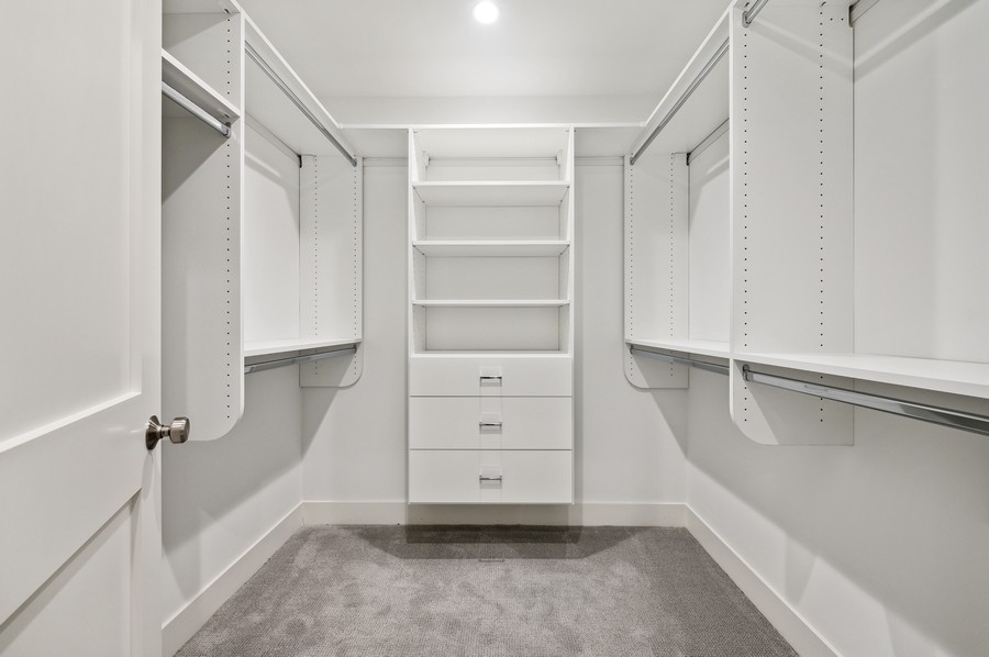 2004 West Addison Street, Unit 1E Chicago, IL 60618 - Photo 19 of 27 a view of an empty walk in closet