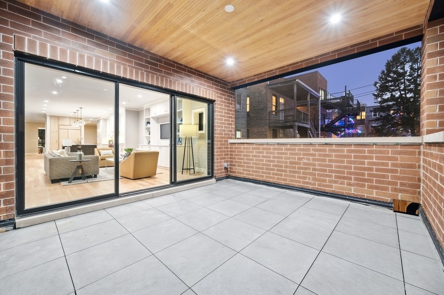 2004 West Addison Street, Unit 1E Chicago, IL 60618 - Photo 27 of 27 a view of front door with outdoor space