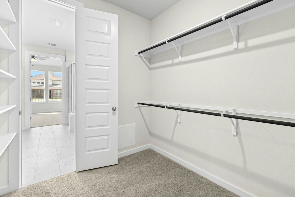 4733 Pleasant Place Round Rock, TX 78665 - Photo 15 of 33 a view of an empty walk in closet