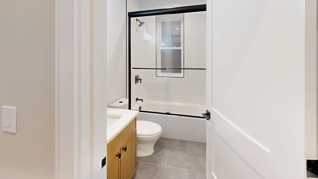 161 Allston Street, Unit 3 Boston, MA 02134 - Photo 9 of 9 a bathroom with a toilet and a shower