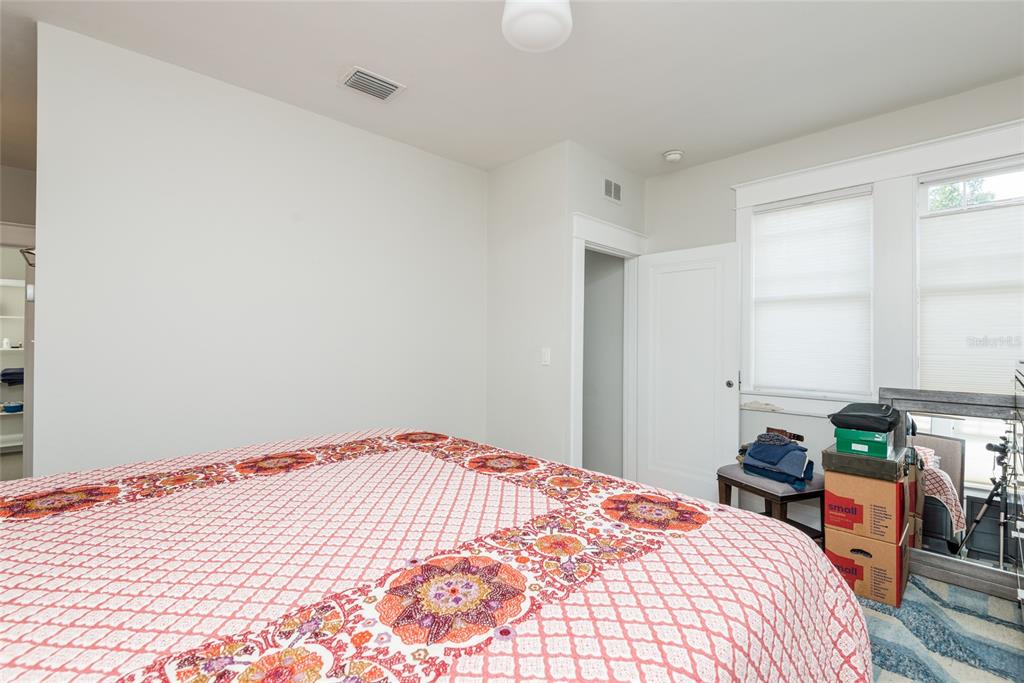 705 West Alfred Street Tampa, FL 33603 - Photo 17 of 25 a bedroom with a bed and window