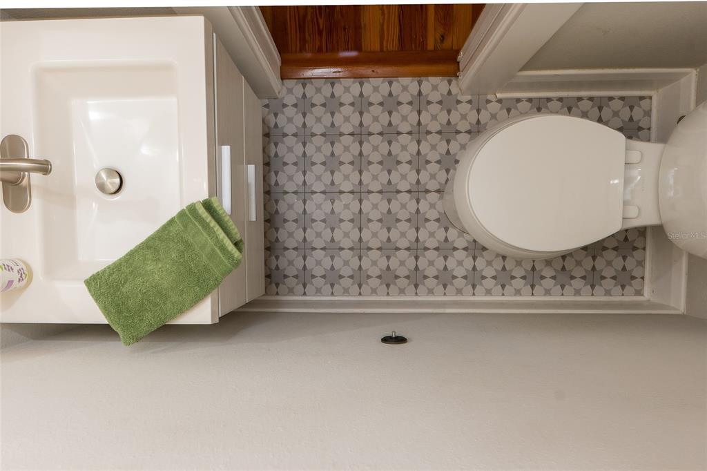 705 West Alfred Street Tampa, FL 33603 - Photo 9 of 25 a bathroom with a sink and a mirror