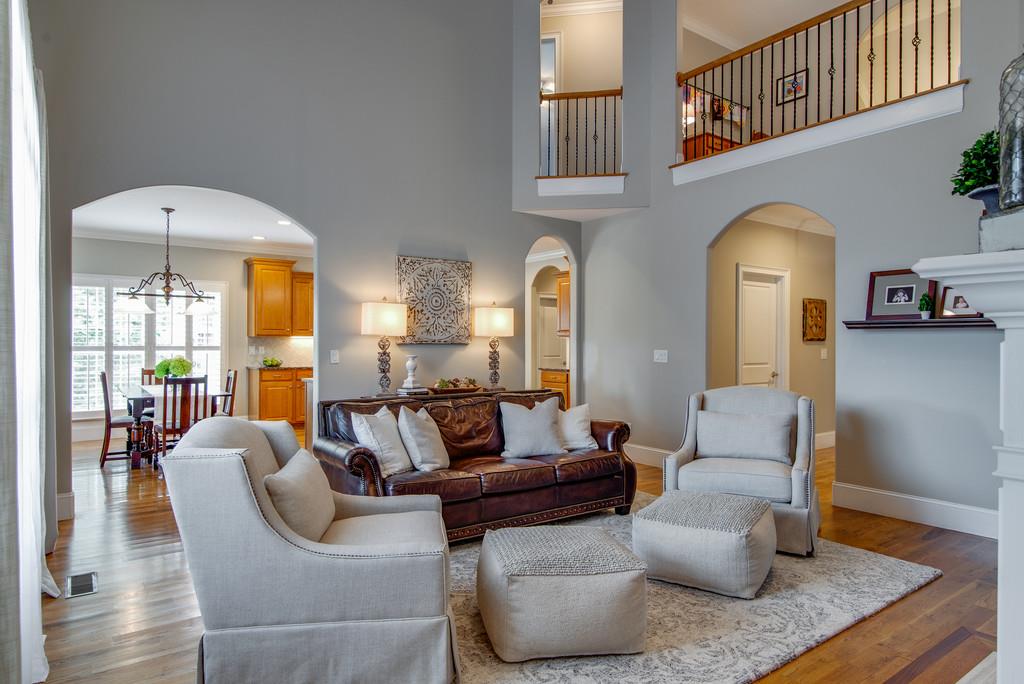 1219 White Rock Road Spring Hill, TN 37174 - Photo 13 of 30 a living room with fireplace furniture and a floor