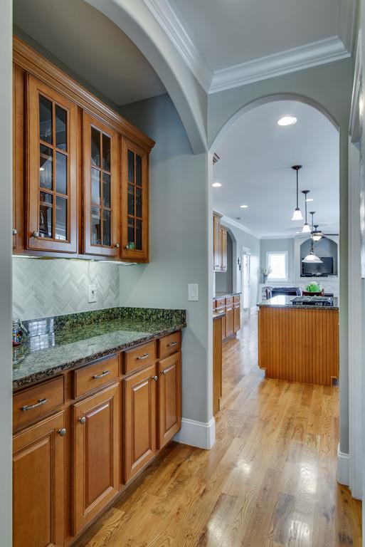 1219 White Rock Road Spring Hill, TN 37174 - Photo 7 of 30 a view of a kitchen with a sink and cabinets