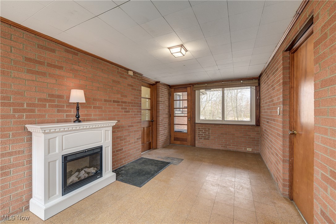 1103 Old Rockside Road Cleveland, OH 44134 - Photo 13 of 25 Light floors and brick wall