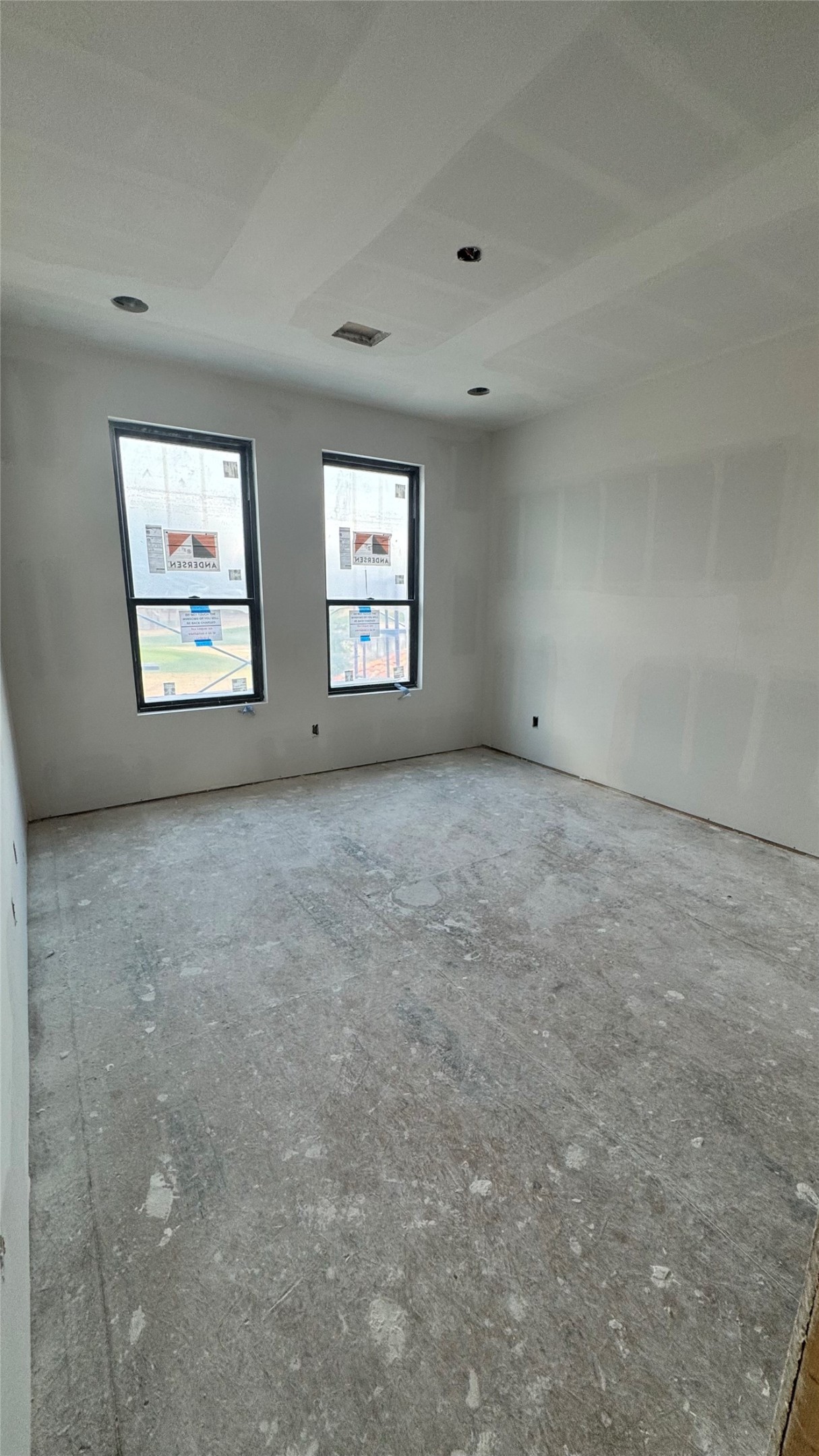 65 Shadow Creek Ridge Drive Spring, TX 77389 - Photo 32 of 35 an empty room with windows and cabinet