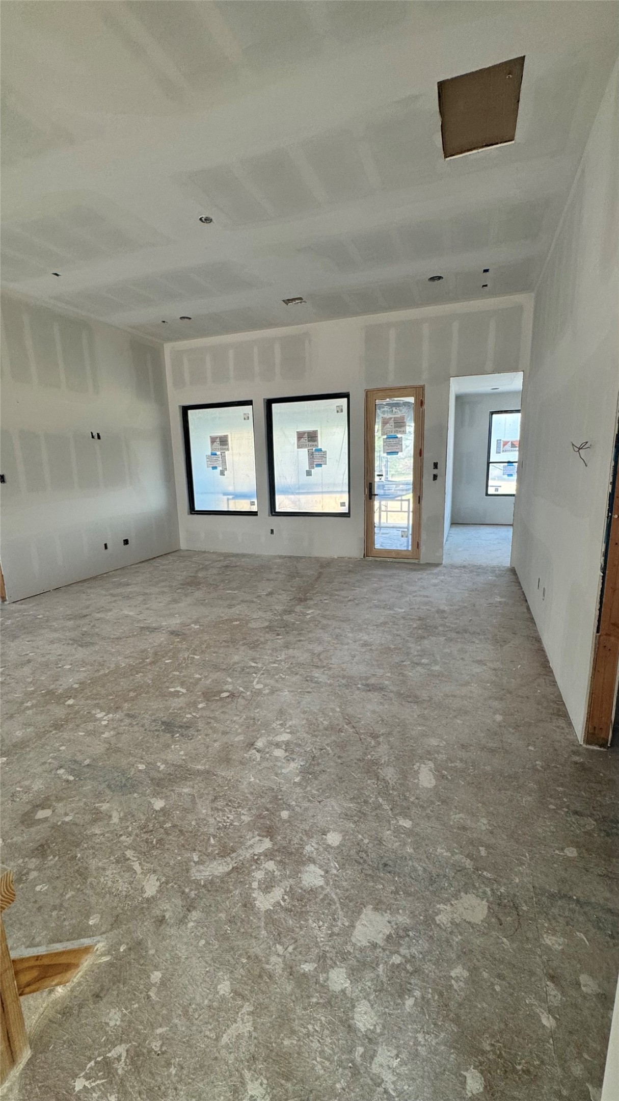 65 Shadow Creek Ridge Drive Spring, TX 77389 - Photo 34 of 35 a view of a livingroom with wooden floor and window