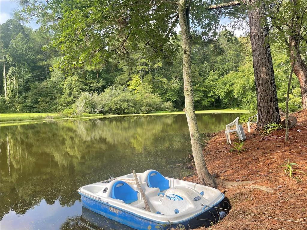 2135 Mountain Road Milton, GA 30004 - Photo 1 of 1 About 140 feet of lake frontage . Pond is 4 acres and 25 feet deep.
