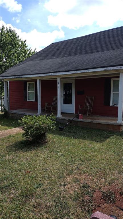 136 Hill Street Commerce, GA 30529 - Photo 5 of 27 a front view of house with yard