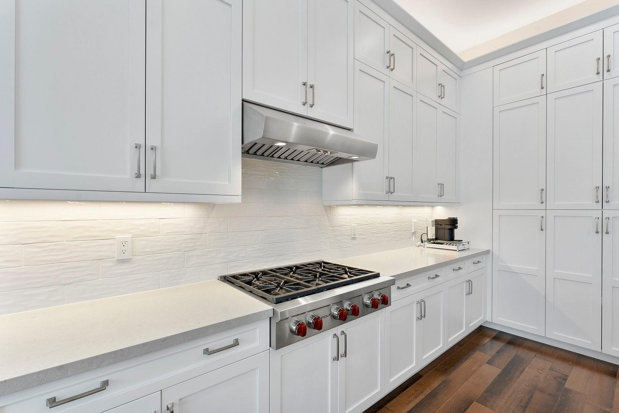 9626 Vescovato Way Boca Raton, FL 33496 - Photo 18 of 72 a kitchen with cabinets and appliances