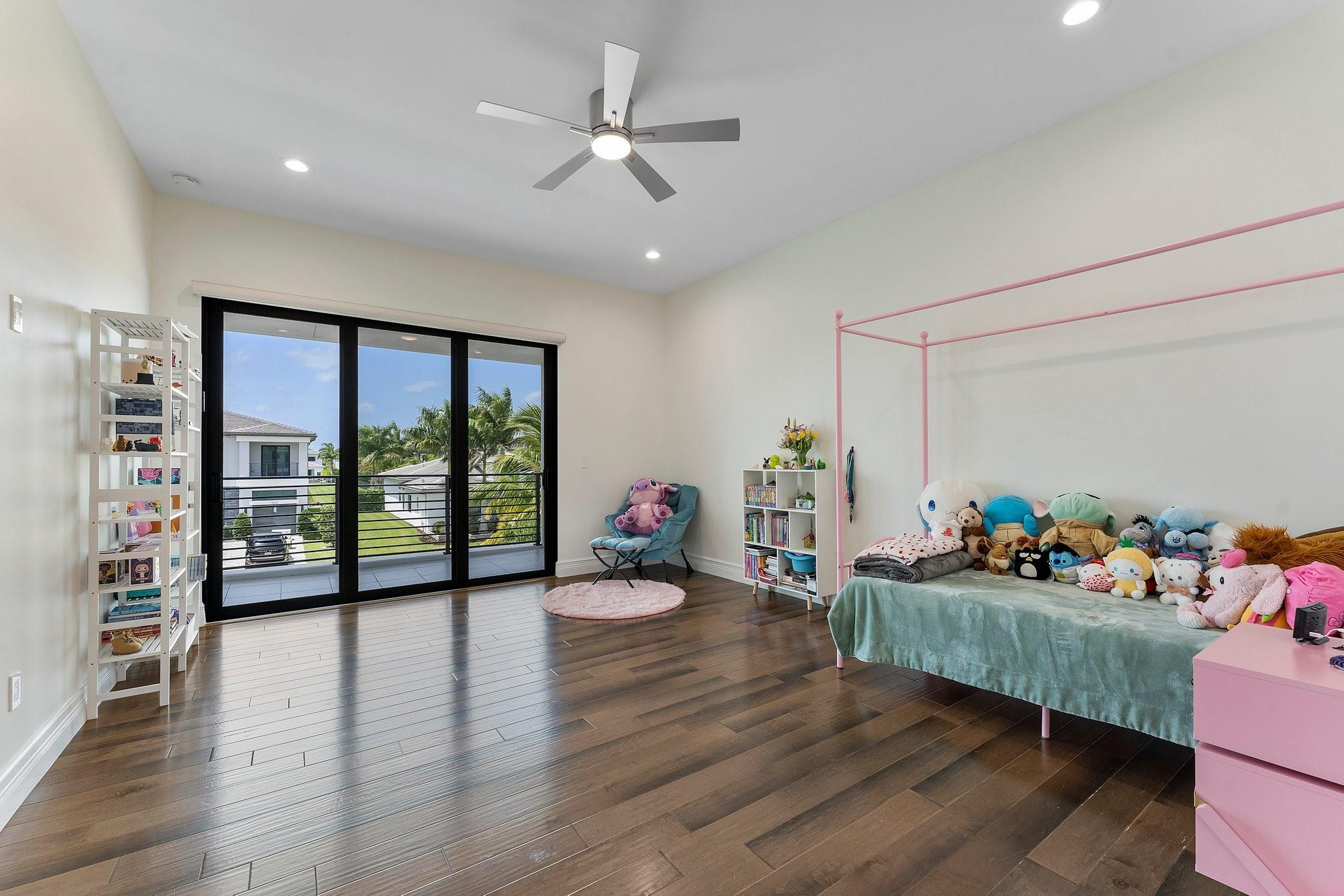 9626 Vescovato Way Boca Raton, FL 33496 - Photo 32 of 72 a living room with furniture and a large window