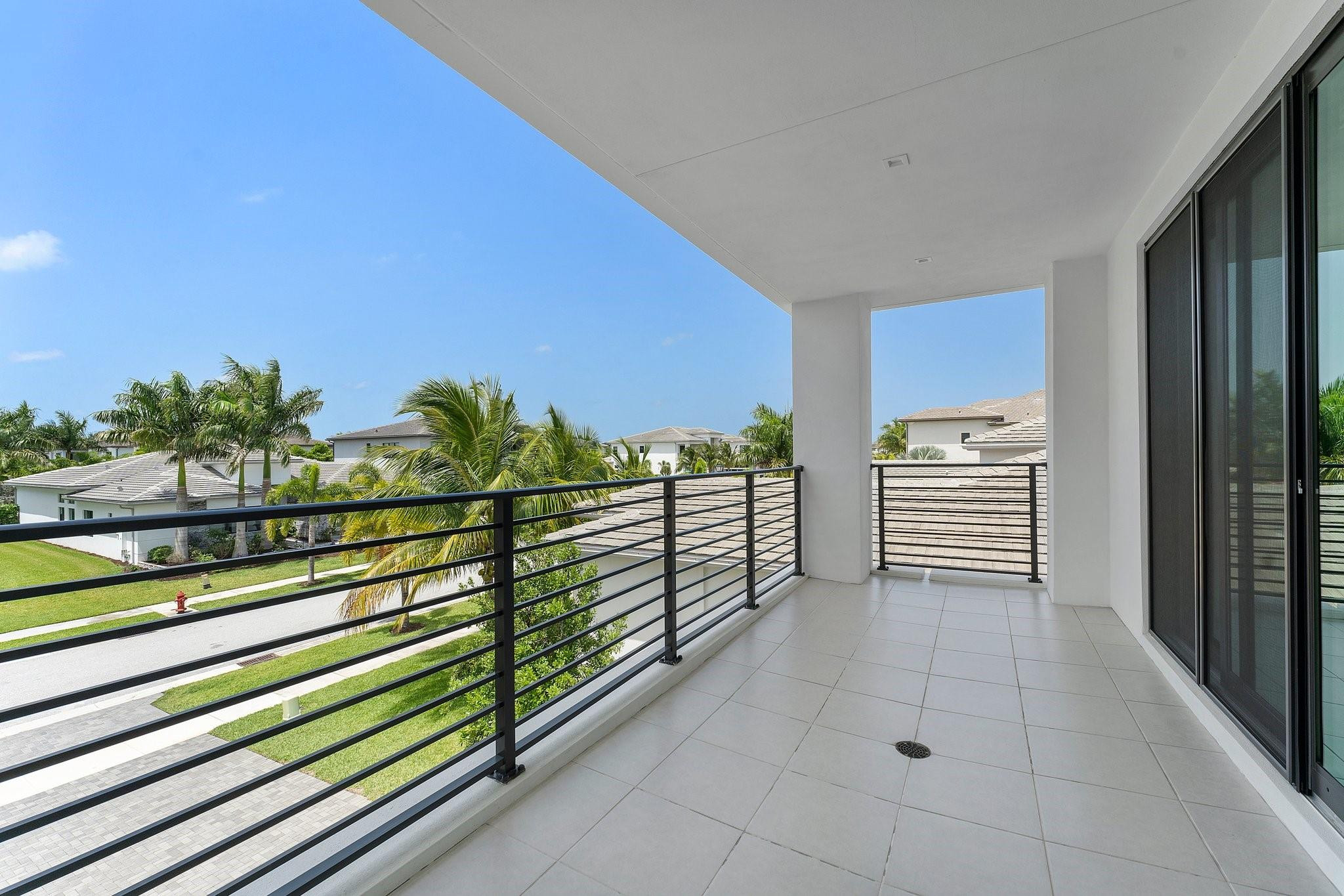 9626 Vescovato Way Boca Raton, FL 33496 - Photo 34 of 72 a view of a balcony with chairs