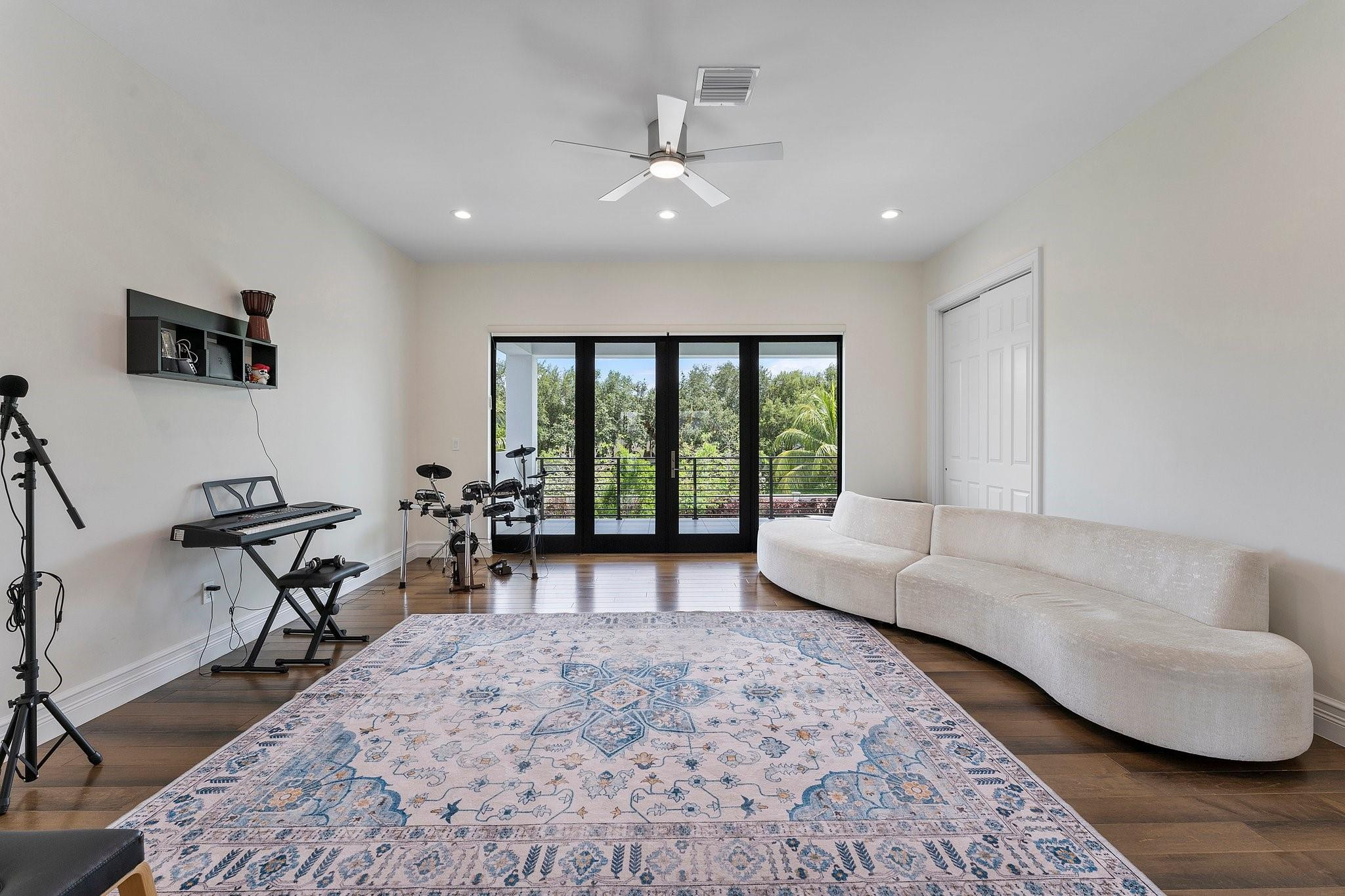 9626 Vescovato Way Boca Raton, FL 33496 - Photo 49 of 72 a living room with furniture and a table