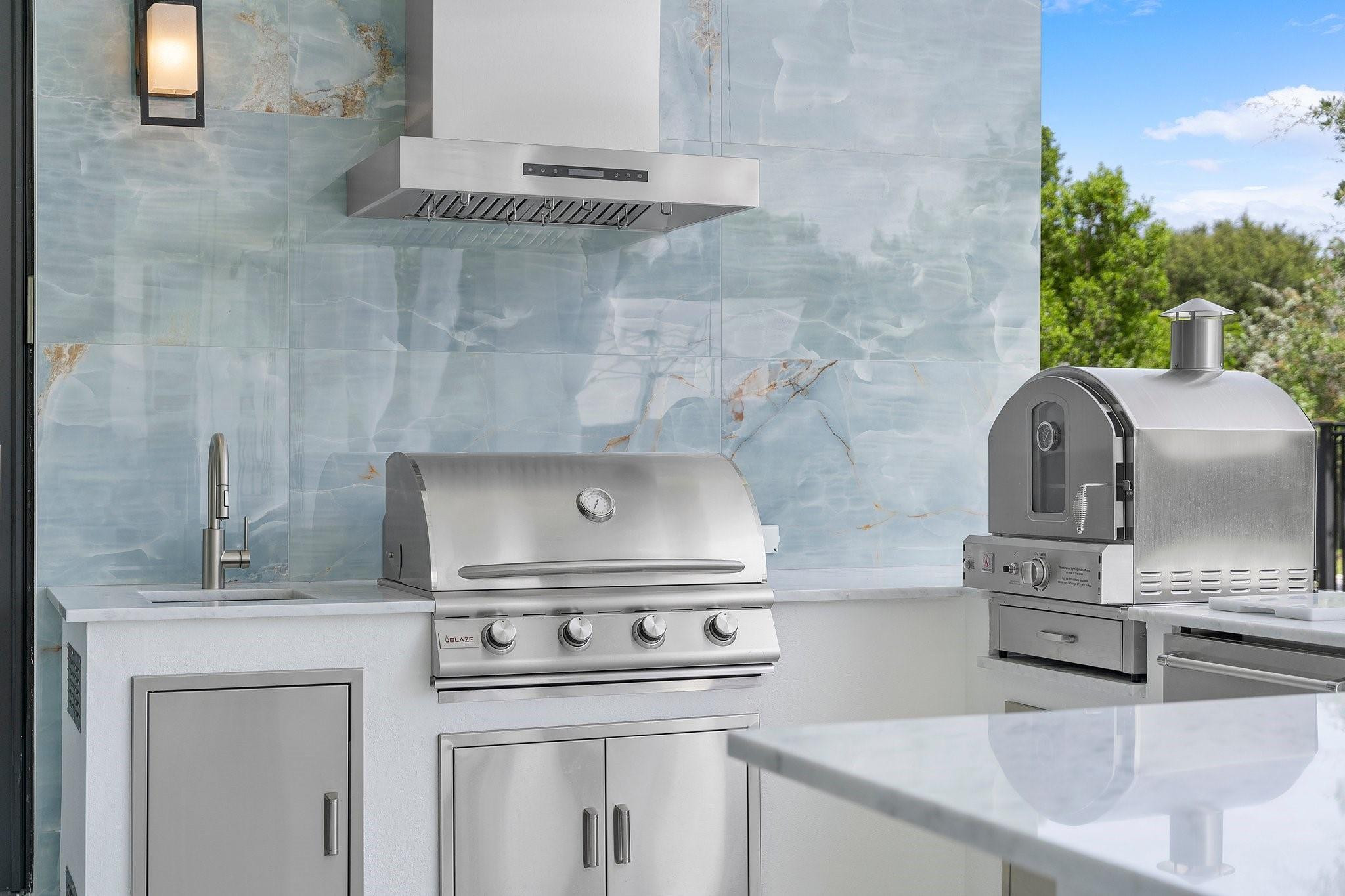 9626 Vescovato Way Boca Raton, FL 33496 - Photo 54 of 72 a close view of a stove top oven and sitting space