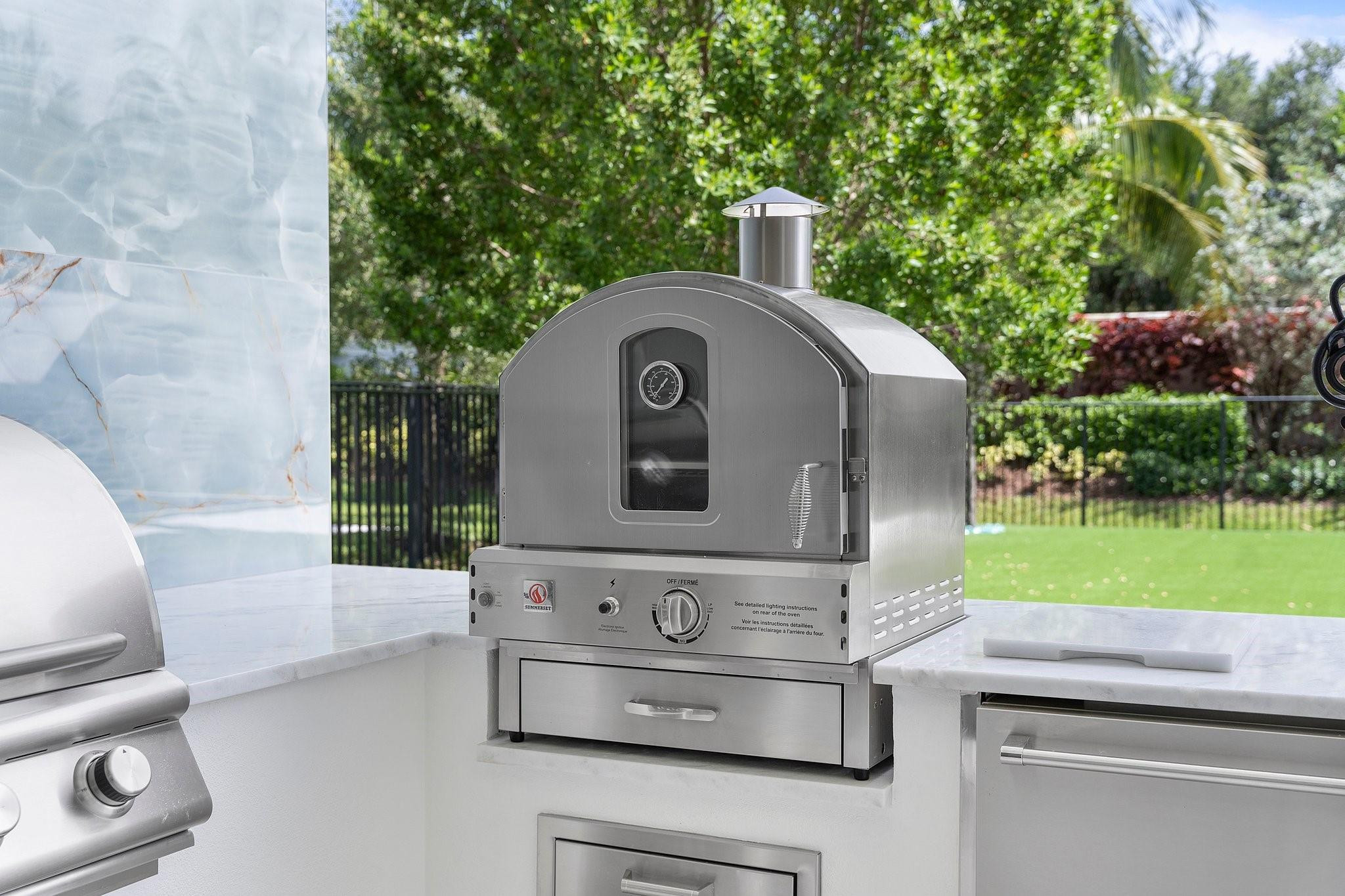 9626 Vescovato Way Boca Raton, FL 33496 - Photo 55 of 72 a front view of a house with a garden