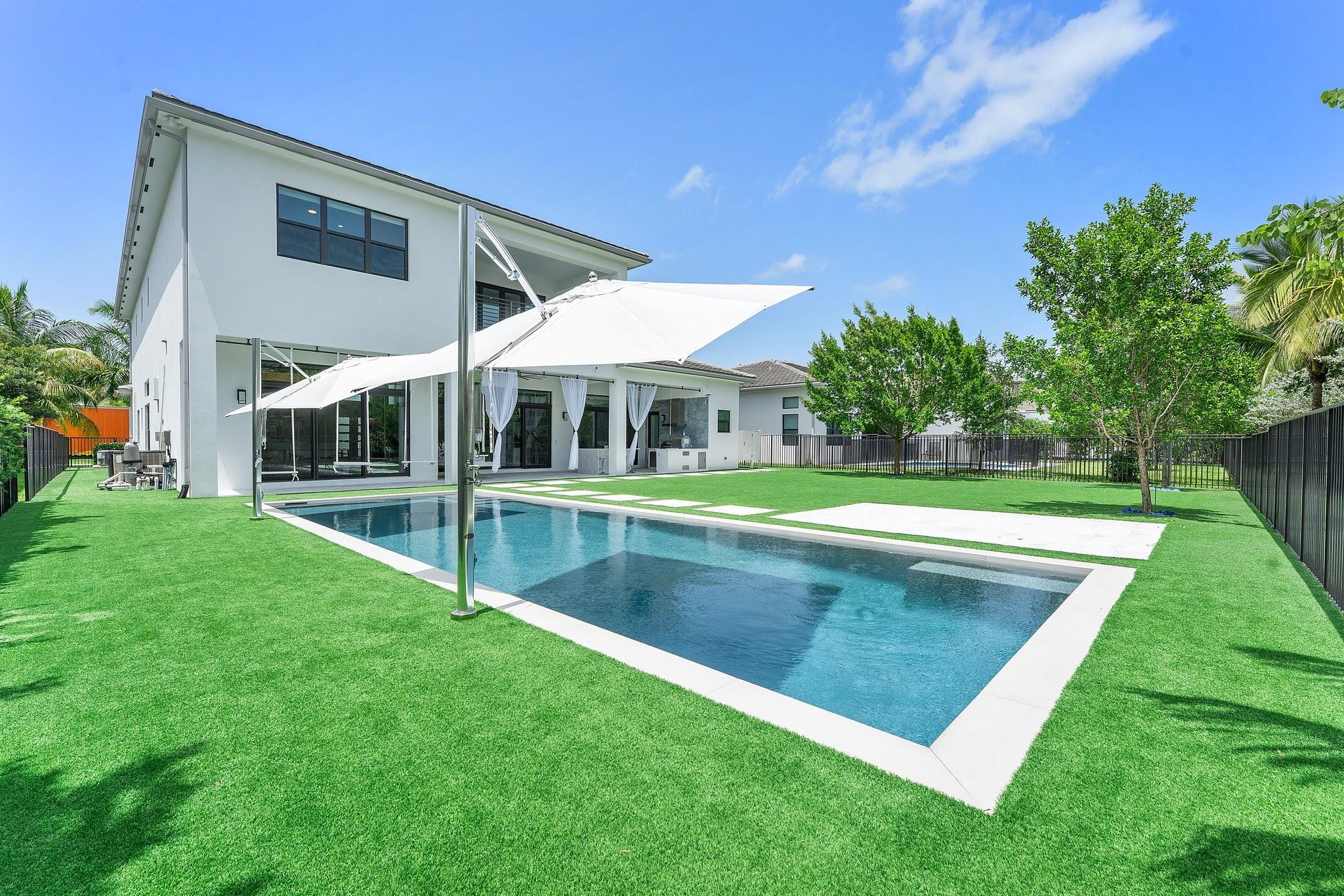 9626 Vescovato Way Boca Raton, FL 33496 - Photo 61 of 72 a view of a house with a swimming pool