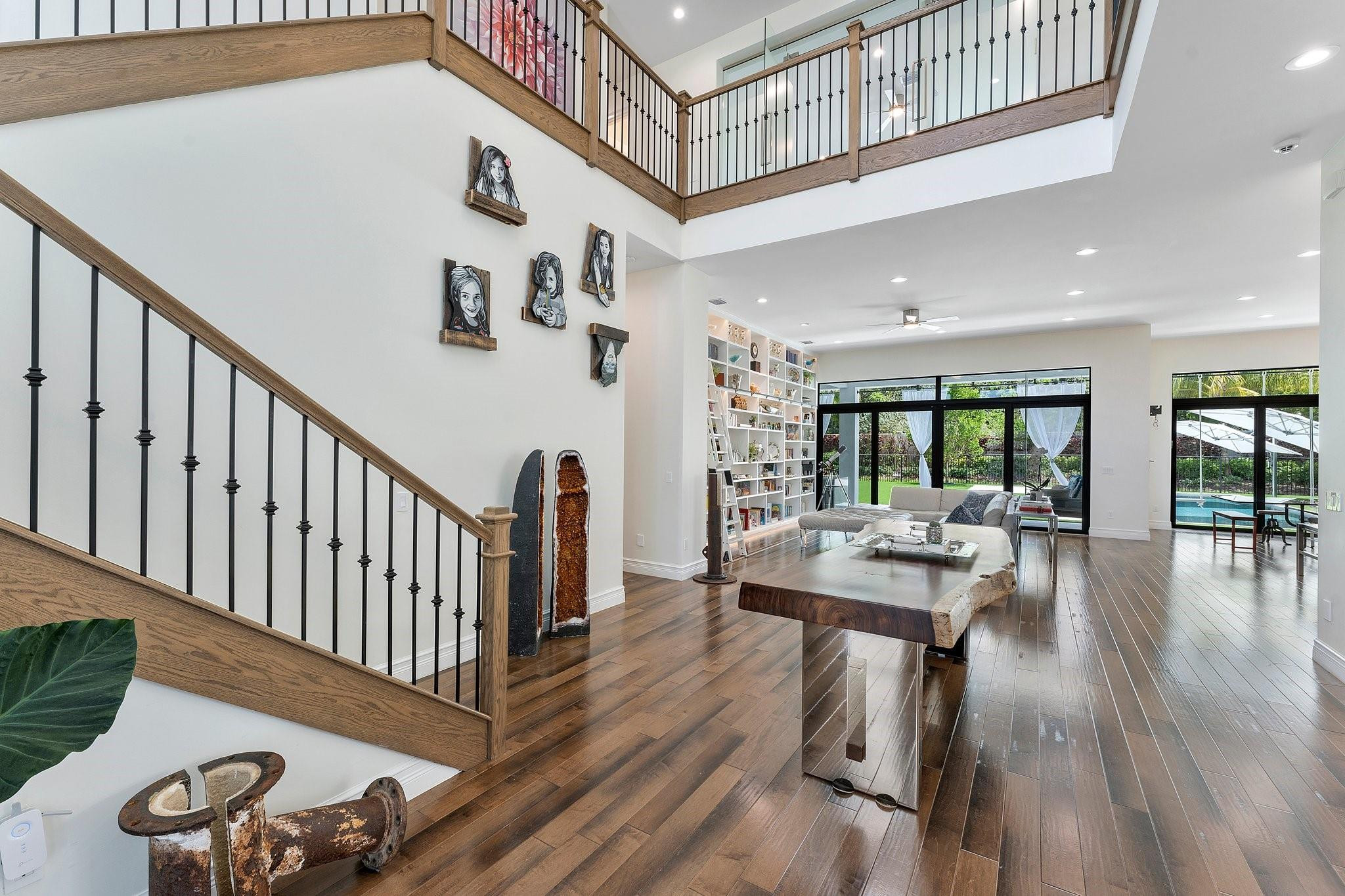 9626 Vescovato Way Boca Raton, FL 33496 - Photo 9 of 72 a view of a dining room with furniture window and wooden floor