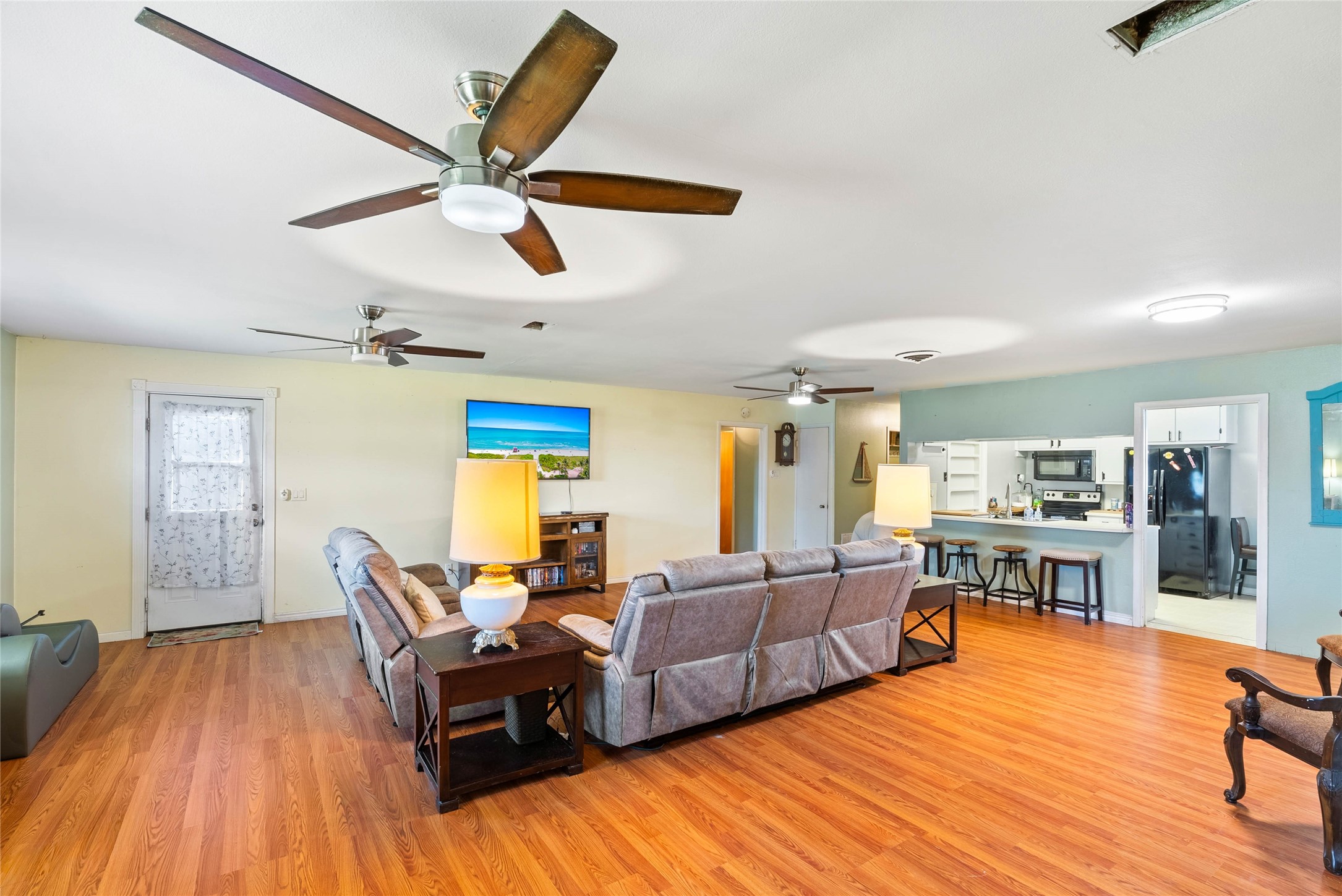 168 Sunset Ingleside, TX 78362 - Photo 6 of 26 Additional view of the vast living room showing the generous floor space and abundant natural light.